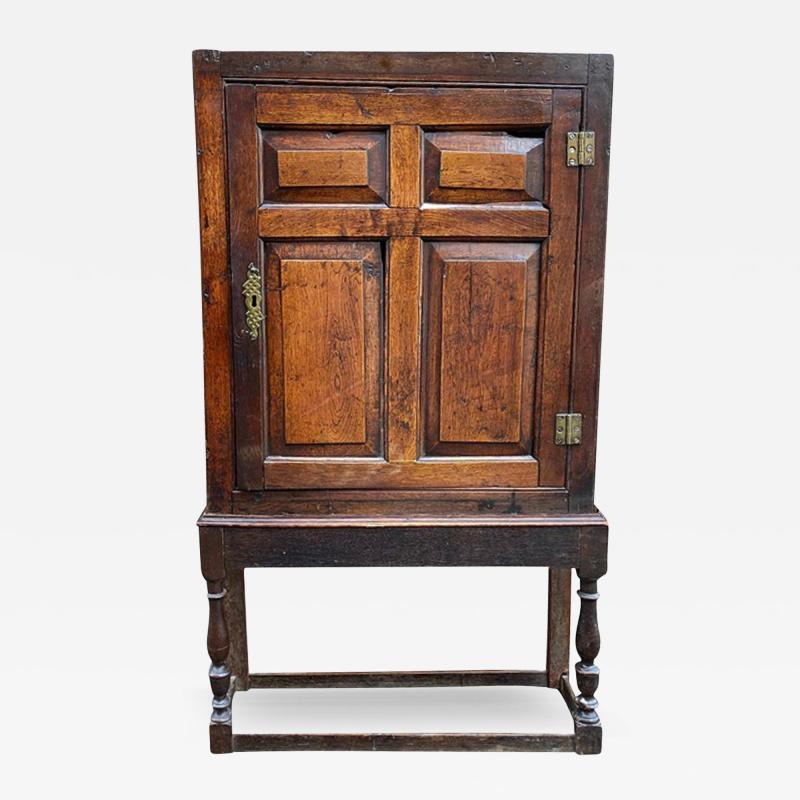 DIMINUTIVE ENGLISH 18TH CENTURY OAK CUPBOARD ON STAND