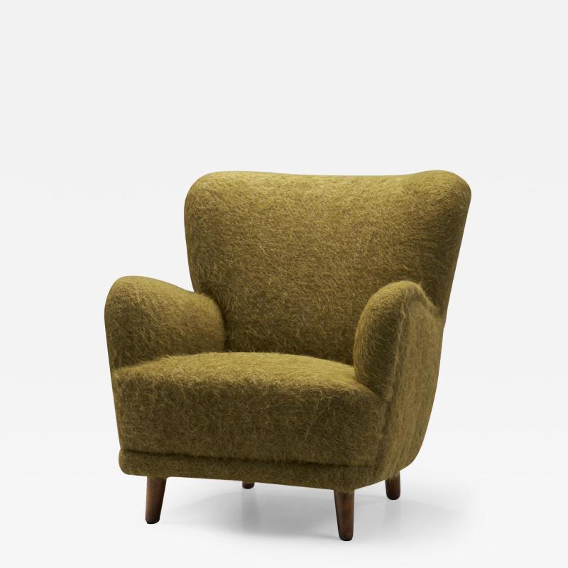 Danish Cabinetmaker Lounge Chair with Dark Stained Wood Legs Denmark ca 1950s