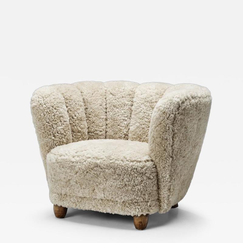 Danish Cabinetmaker Lounge Chair with Sheepskin Upholstery Denmark 1940s