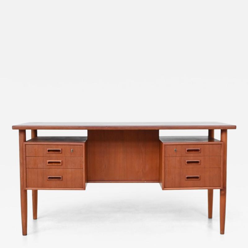 Danish freestanding symmetric desk in teak Denmark 1960