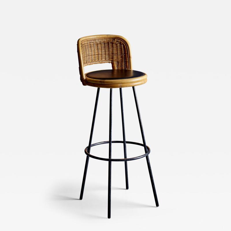 Danny Ho Fong Wrought iron and wicker bar or counter stool chair designed by Danny Ho Fong