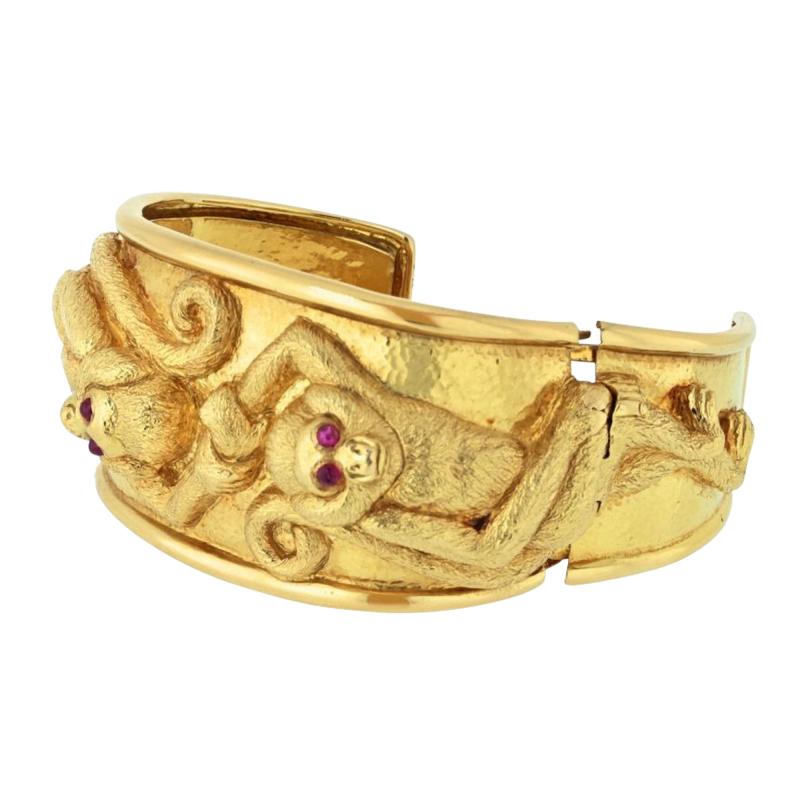 David Webb DAVID WEBB PLATINUM 18K YELLOW GOLD REPOUSSE MONKEY RUBY EYES CUFF BRACELET