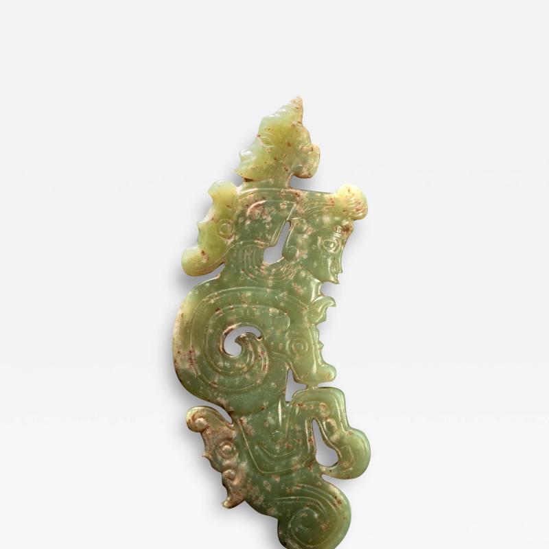Dragon Pendant with Human Metamorphic Themes Western Zhou Period