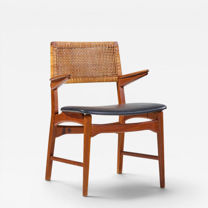E Knudsen for Jensen Lykkegaard Model 48 Danish Teak Cane Dining Arm Chair