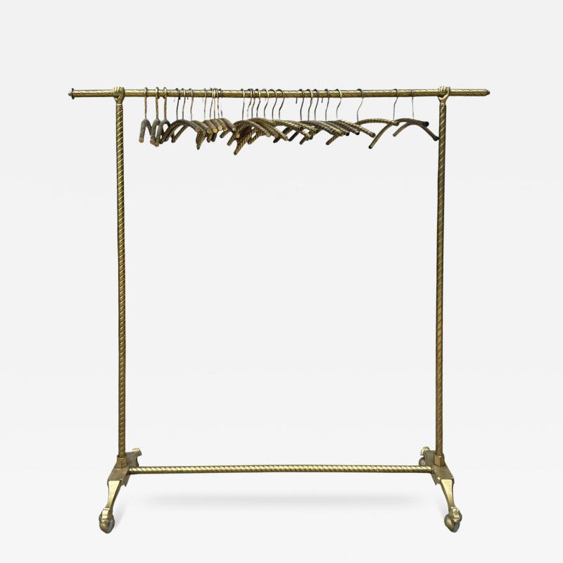 EXCEPTIONAL 1920s BRASS CLOTHING RACK WITH HAND DESIGN 26 FANCY BRASS HANGERS