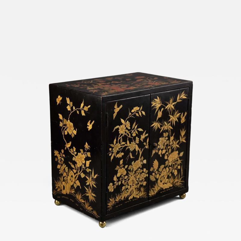 Early 20th century highly decorative Chinese lacquered table cabinet