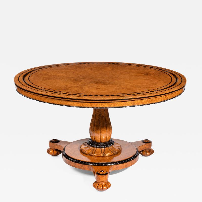 Early Victorian amboyna centre table