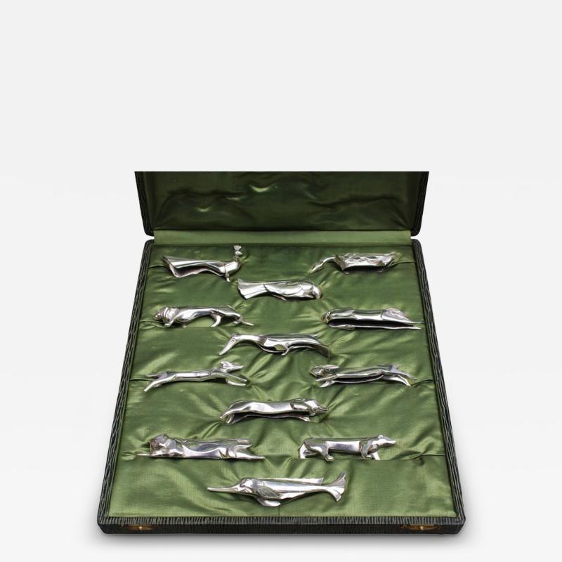 Edouard Marcel Sandoz Set of 12 Fine French Art Deco Silver Plated Gallia Knife Rests by Christofle