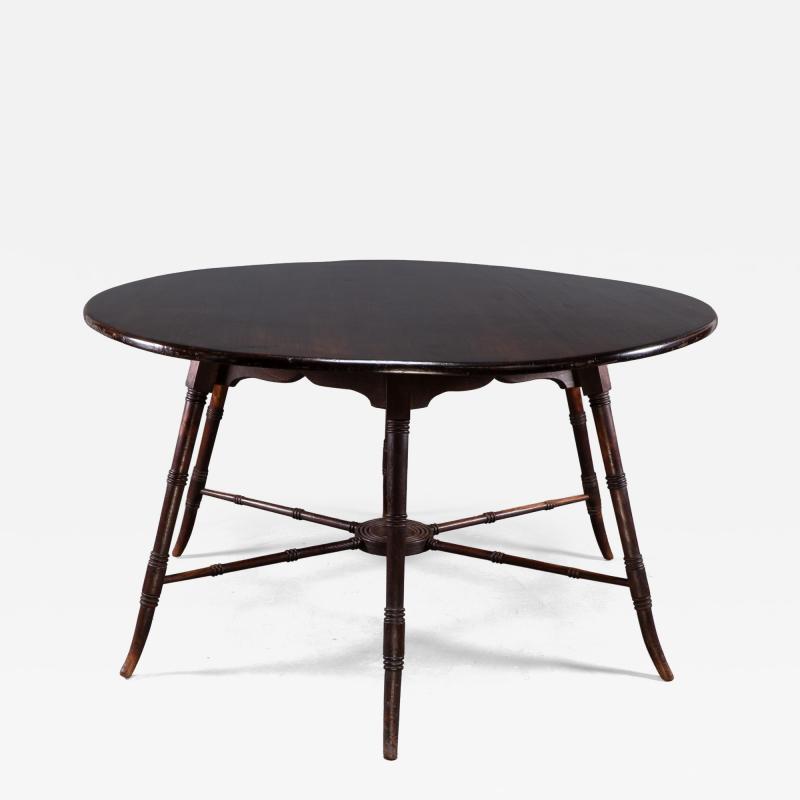 Edward William Godwin E W Godwin an Anglo Japanese Aesthetic Movement walnut centre or dining table