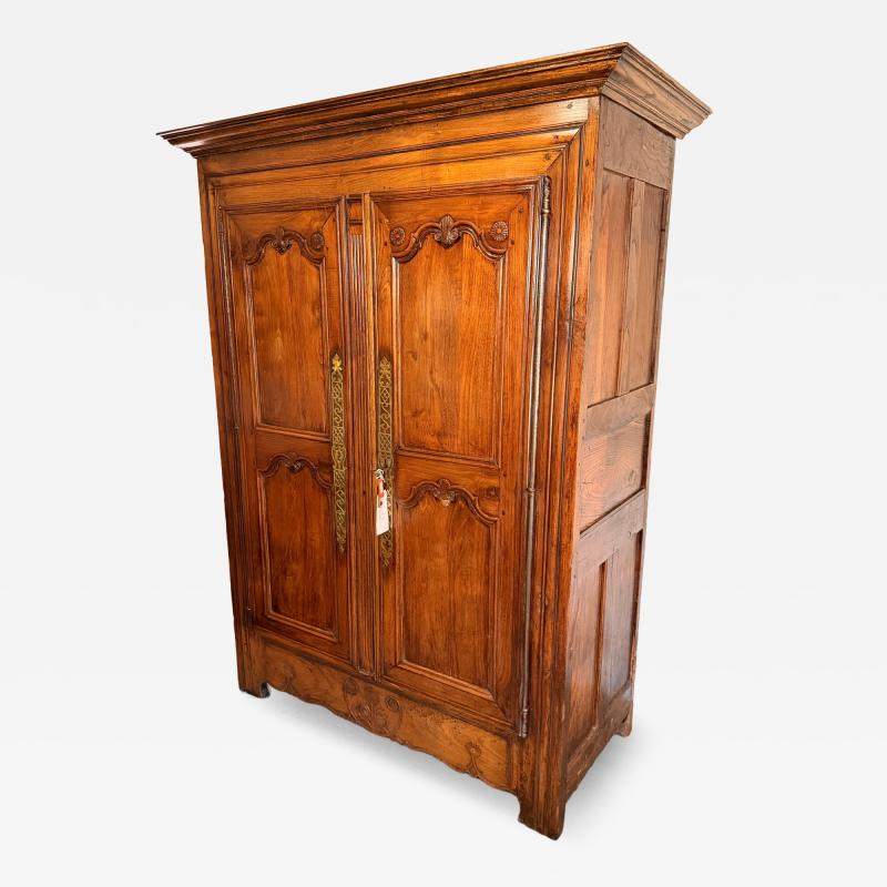 Eighteenth century Walnut Armoire finely carved elements 2 doors