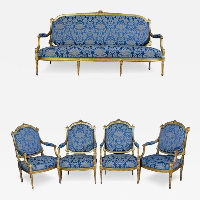 Elegant French 19 Century Gilt Living Room Suite with a Sofa and Four Armchairs