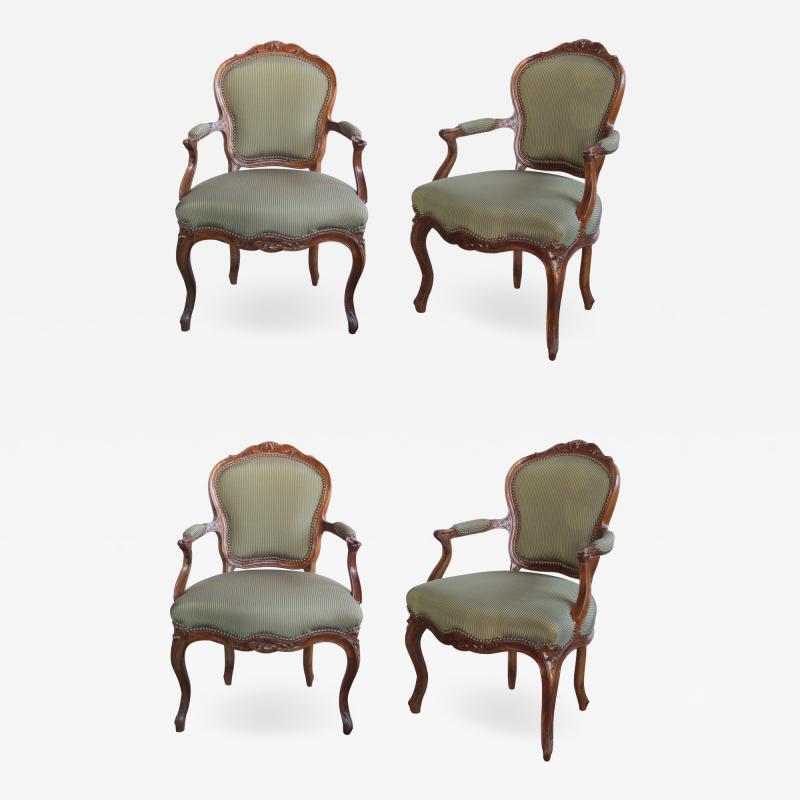 Elegant Set of 4 French Louis XV Style Carved Walnut Open Armchairs