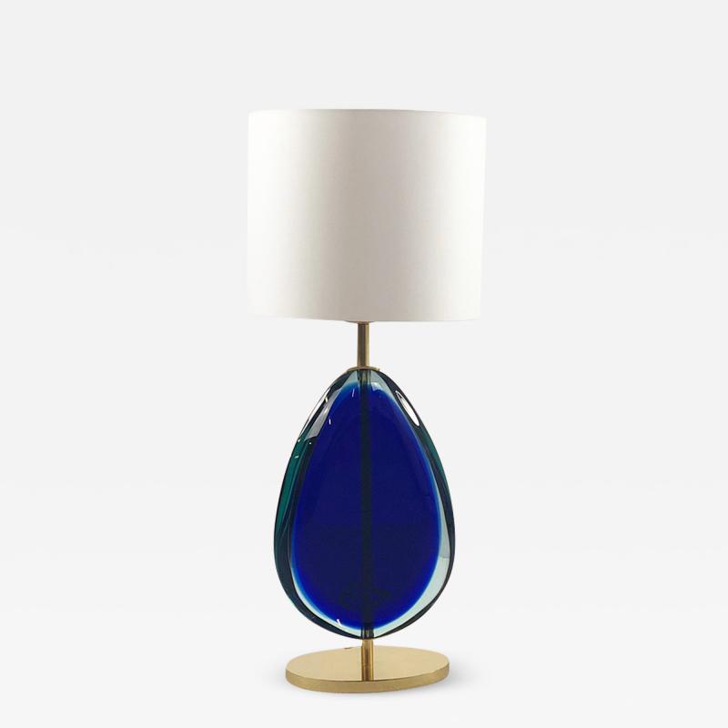 Elegant pair of glass and brass table lamps