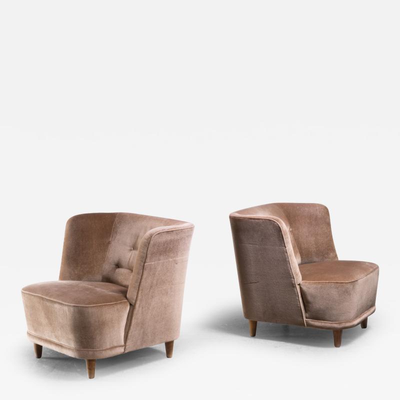 Elna Kiljander Pair of Elna Kiljander three seater armchairs