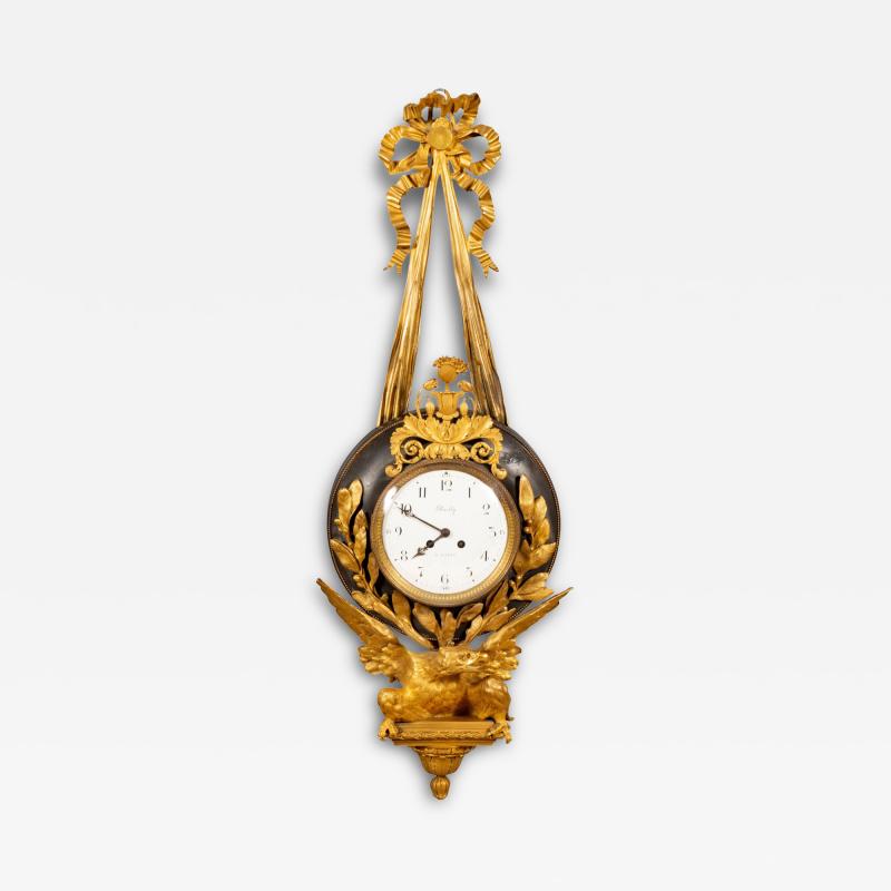 Empire Bronze and Ormolu Cartel Clock by Bailly Paris