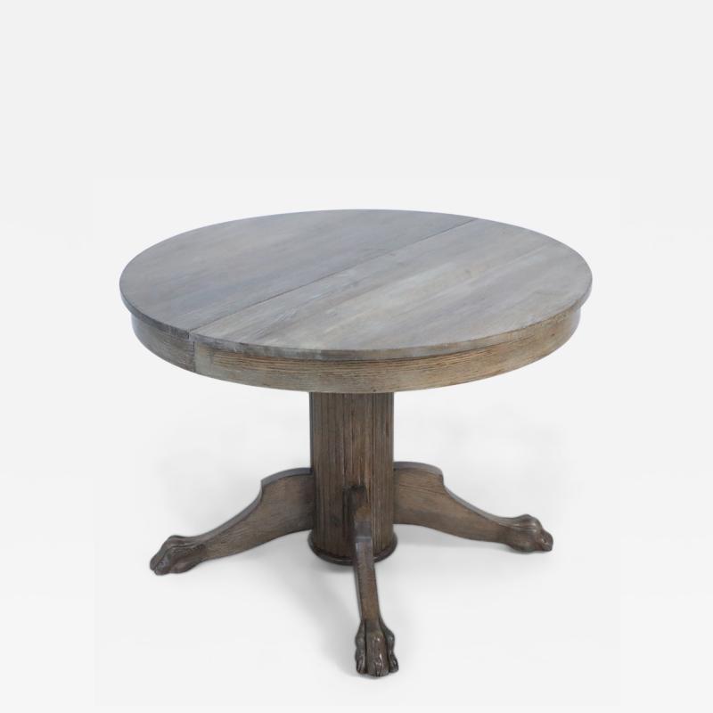 English Edwardian Cerused Oak Circular Claw Foot Center Dining Table with Leaves