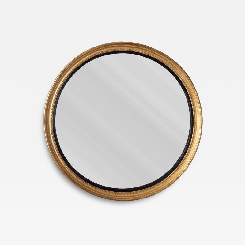 English George III Giltwood and Ebonized Frame Convex Mirror circa 1800