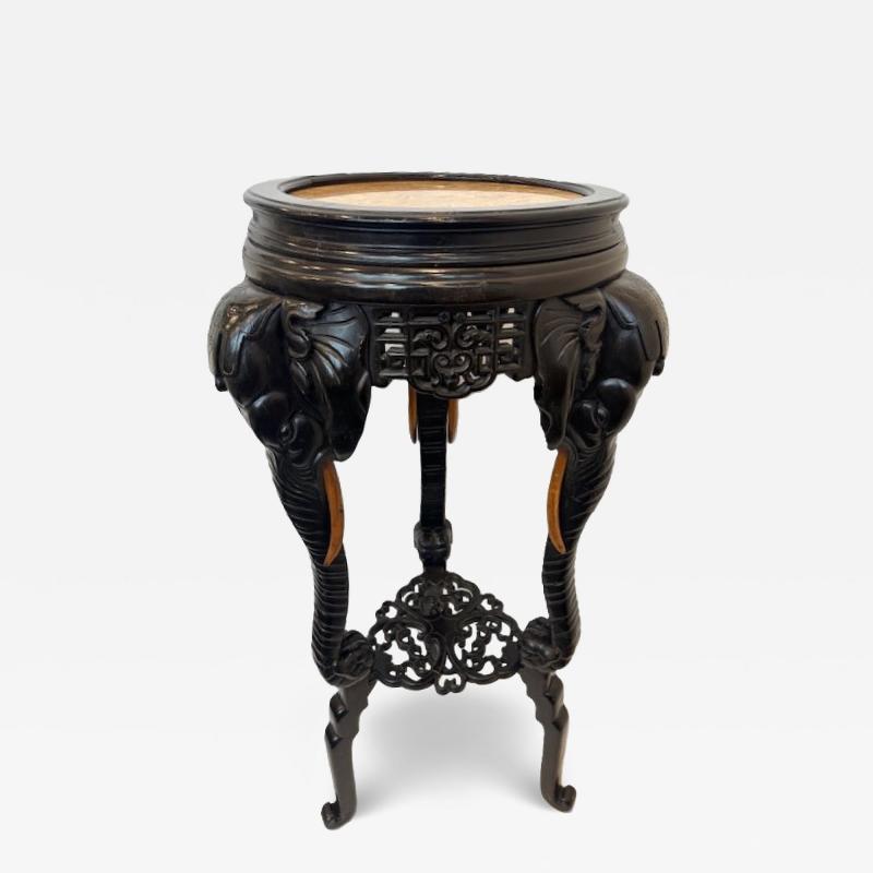 English Regency style ebonized 3 elephant leg pedestal and inset marble top