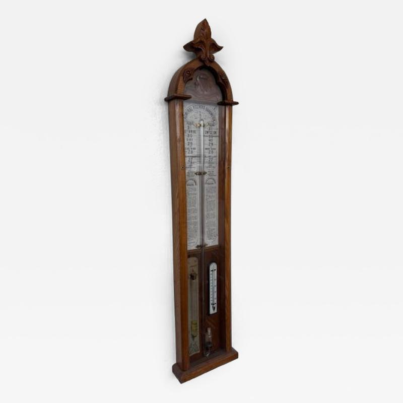 English Victorian Admiral Fitzroys wall barometer in an oak case