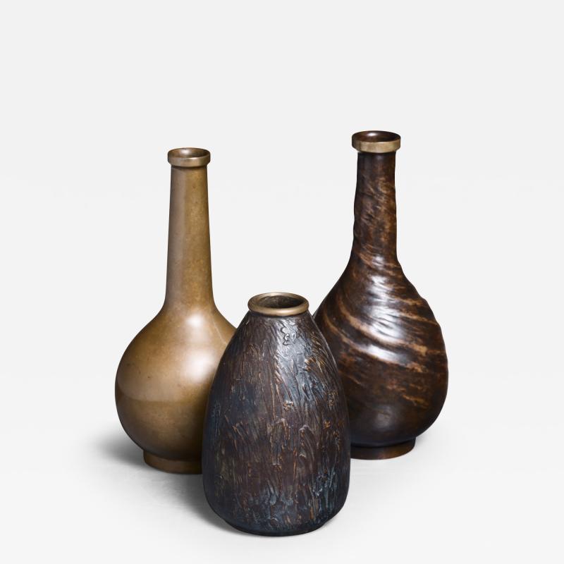 Evan Jensen Set of three Evan Jensen bronze vases