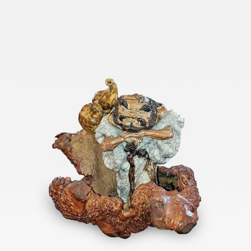 Exceptional Japanese Ceramic Figure in Knotted Wooden Stand