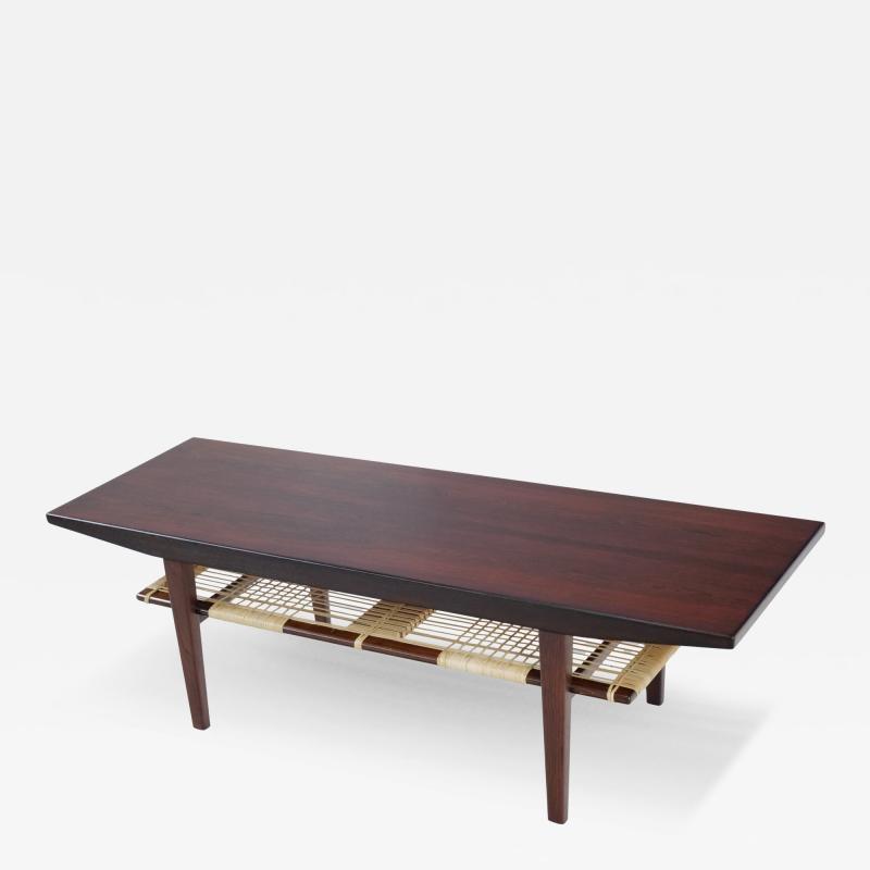 Exceptional Scandinavian Modern Rosewood Coffee Table w Caned Shelf