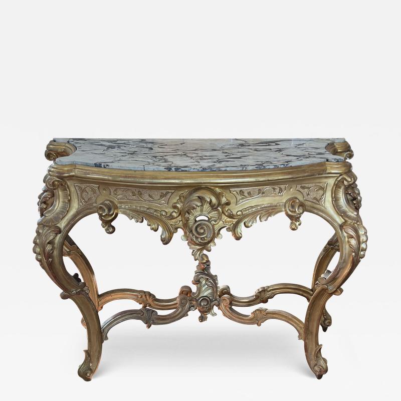 Exuberantly carved French Rococo Revival Giltwood Console Table with Marble Top