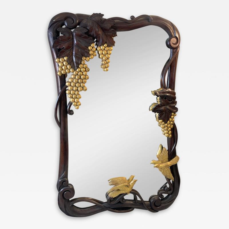 FANTASTICAL CARVED ART NOUVEAU MIRROR WITH GILT GRAPES AND BIRDS