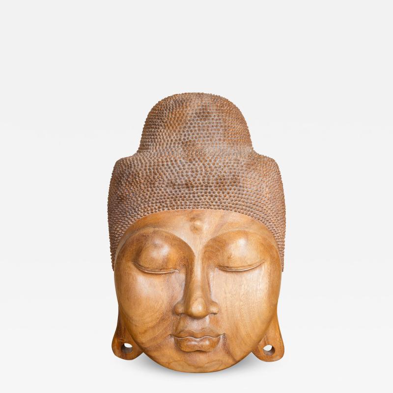 FINELY CARVED WOODEN BUDDHA FACE