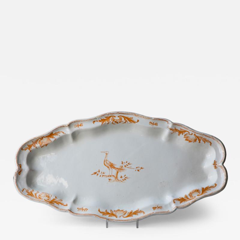 FRENCH 18TH CENTURY LARGE OVAL EARTHENWARE SERVING DISH WITH A SHAPED EDGE