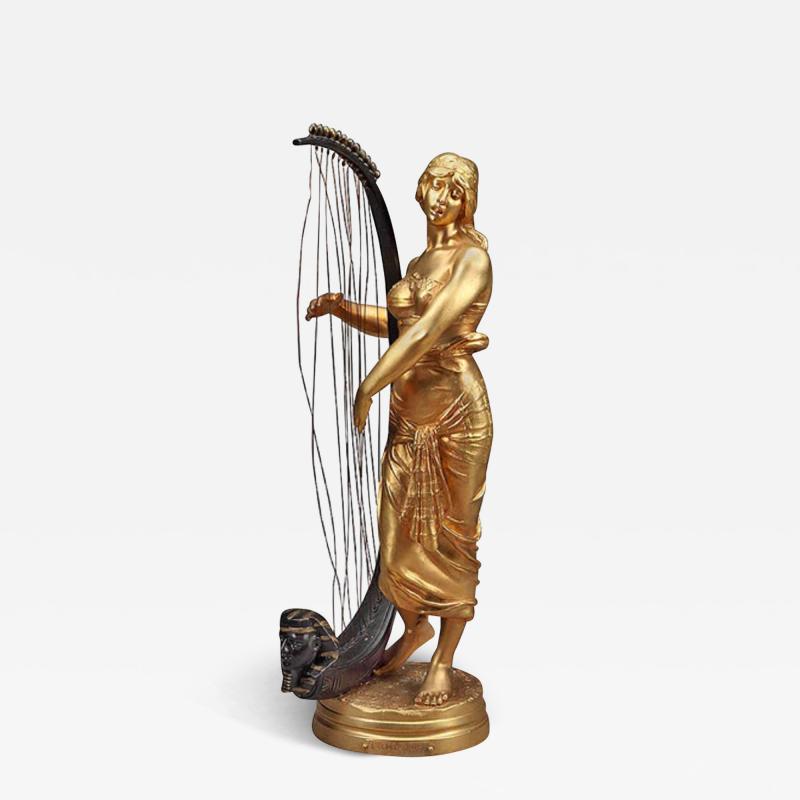 FRENCH GILT BRONZE FIGURE OF AN ORIENTALIST WOMEN PLAYING THE HARP