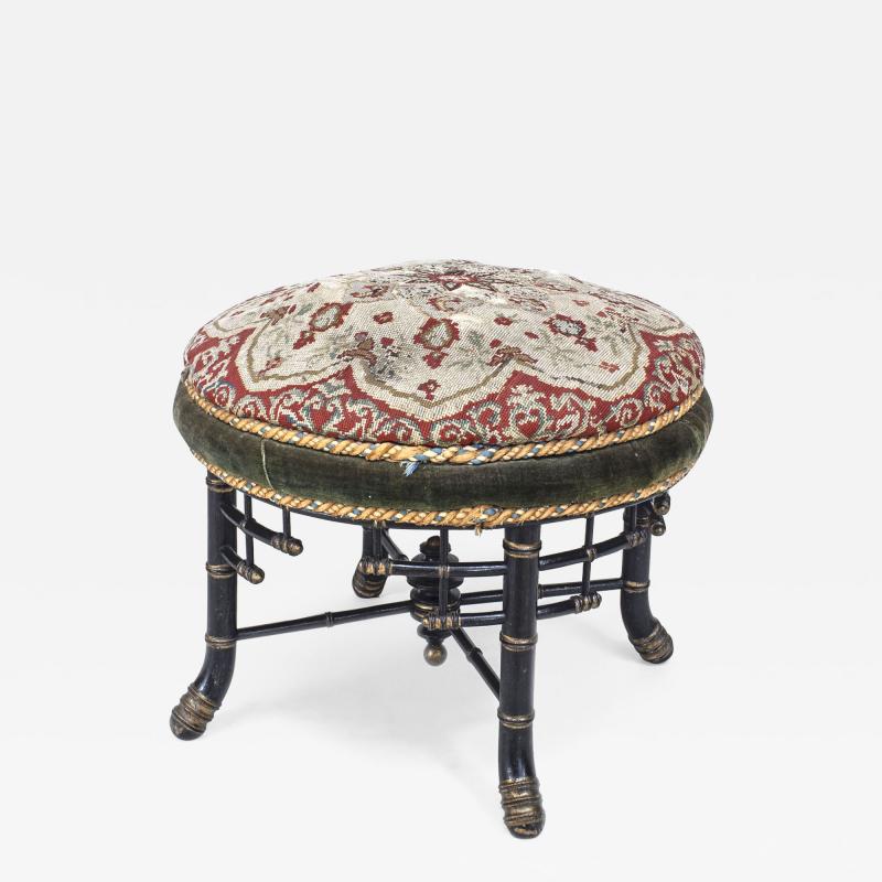 Faux bamboo ebonized and gilt trimmed round stool bench