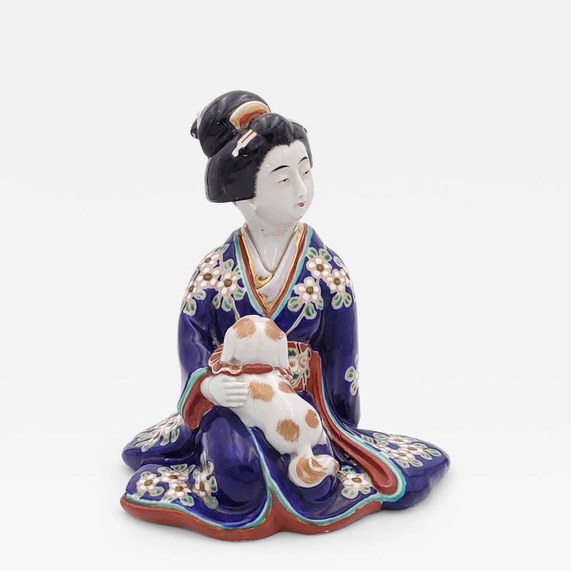 Figure of Geisha Holding a Puppy Japan circa 1920