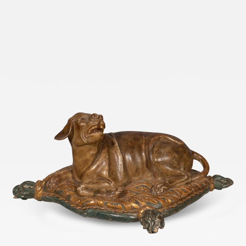 Fine European Carved and Painted Dog Lying on a Pillow