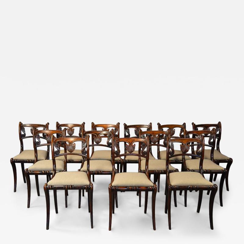 Fine quality set of thirteen Regency simulated rosewood dining chairs