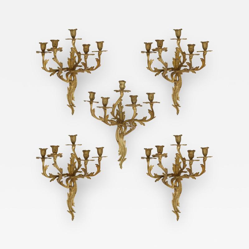 Five antique Louis XV style gilt bronze wall sconces