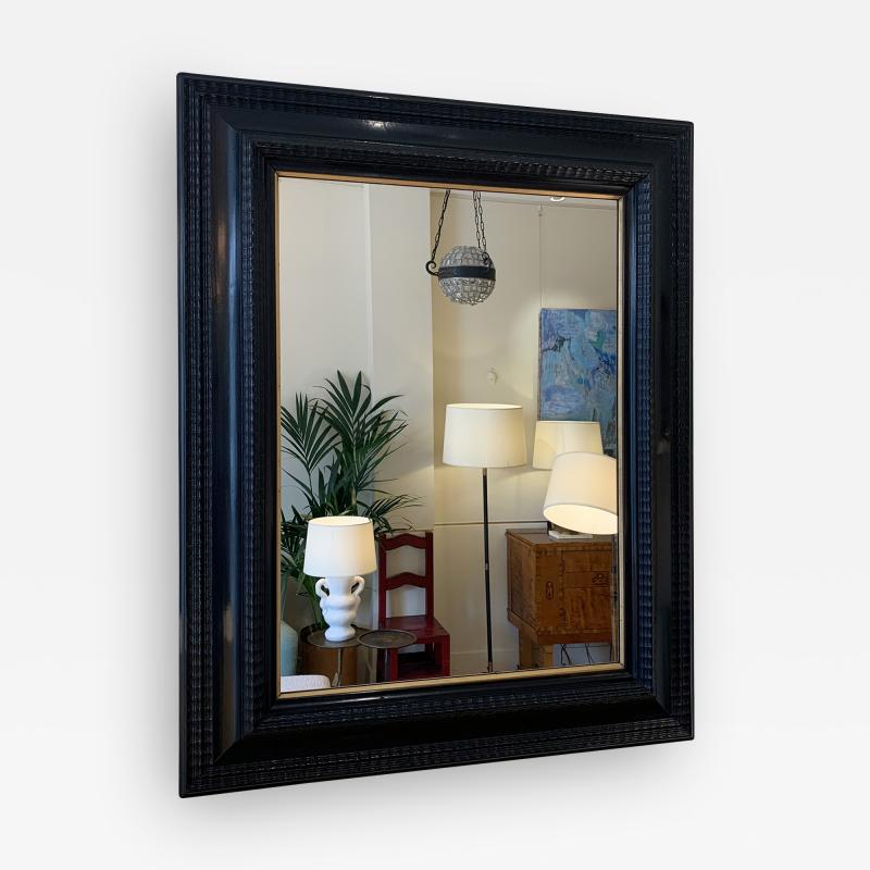 Flemish Style Ebonised Ripple Frame Mirror