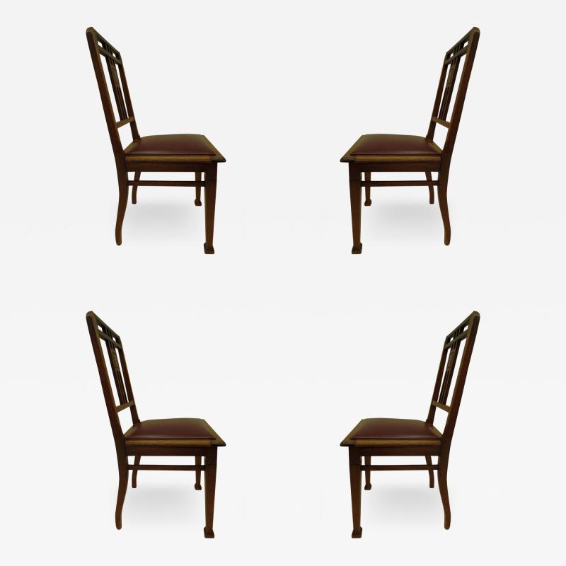 Four French Early Modernist Wood Dining Chairs with Inlaid Brass Grid Back
