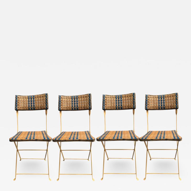 Four garden chairs in woven rattan and lacquered iron France circa 1950