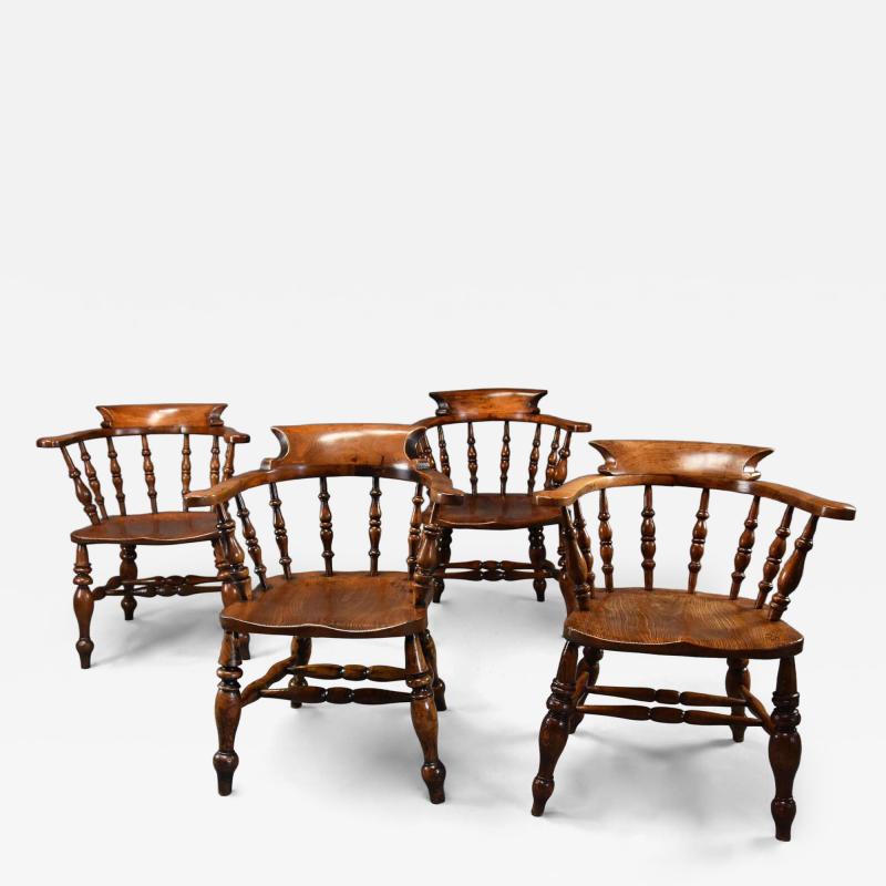 Four mid 19th century smokers bow Windsor or Captain s chairs