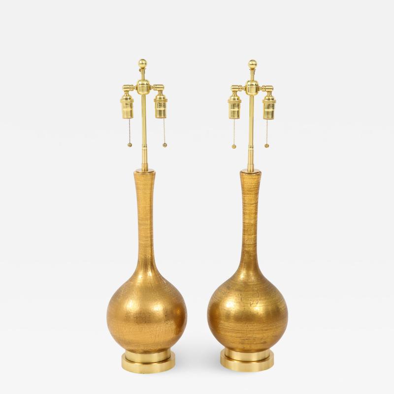 Frederick G Cooper Pair of Frederick Cooper Gold Ceramic lamps 