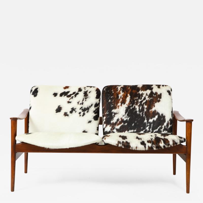 Fredrik Kayser A Fredrik A Kayser Teakwood and Cowhide Settee or Loveseat