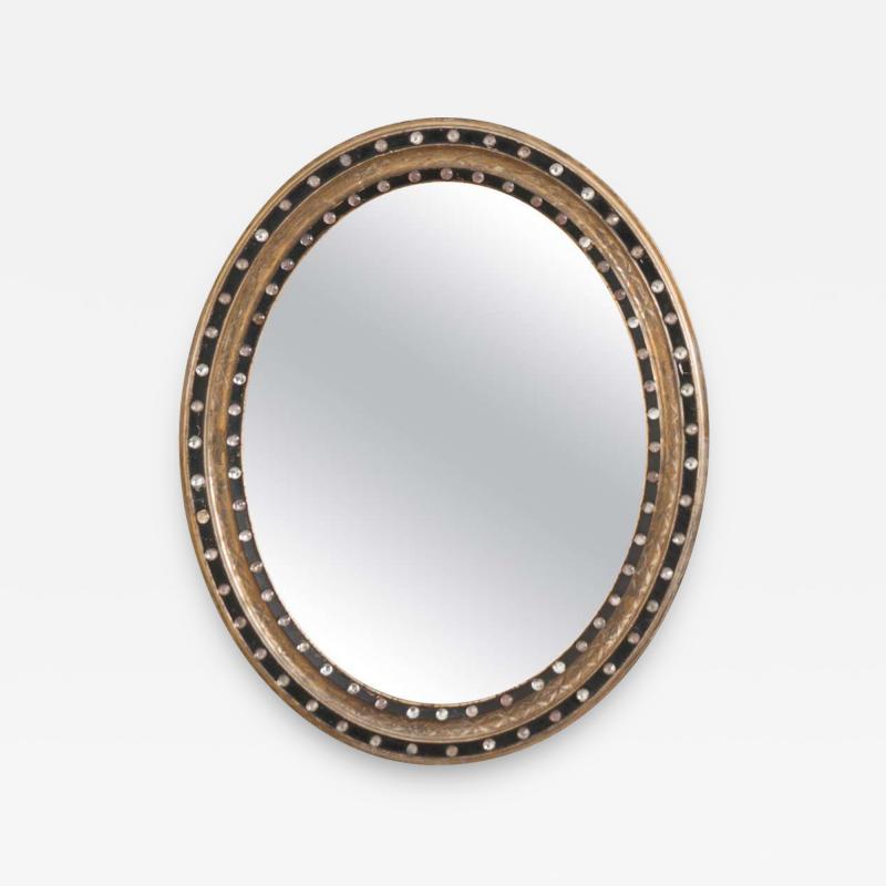 French 19th Century Ebony and Gilt Oval Mirror
