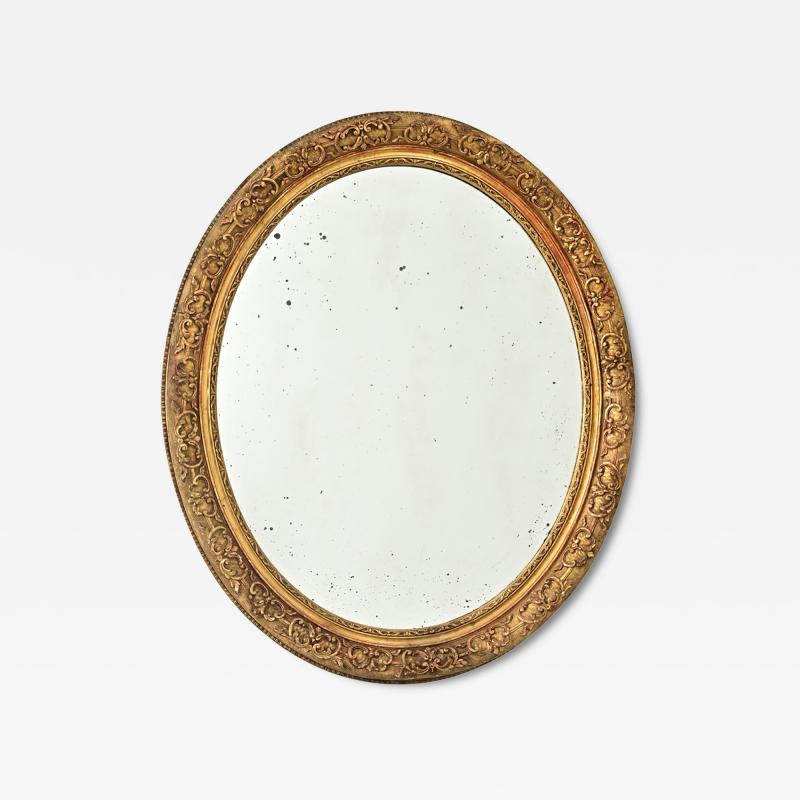 French 19th Century Massive Oval Gilt Mirror