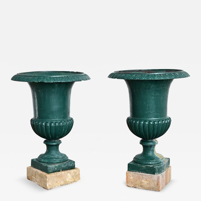 French 19th Century Pair of Cast Iron Urns on Stone Bases