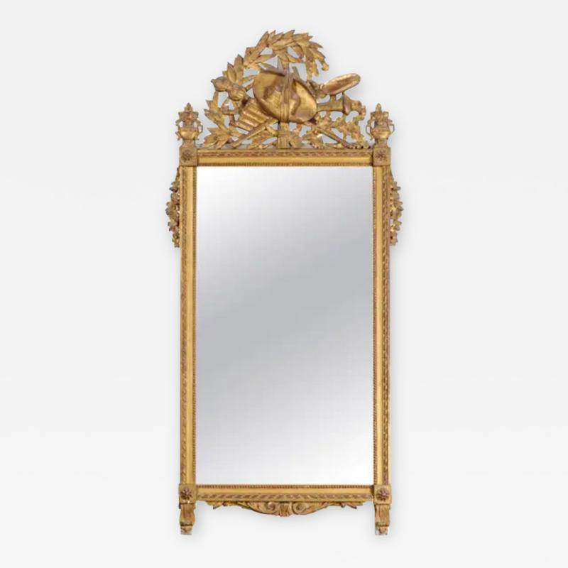 French Late 18th Century Louis XVI Period Giltwood Mirror with Carved Crest