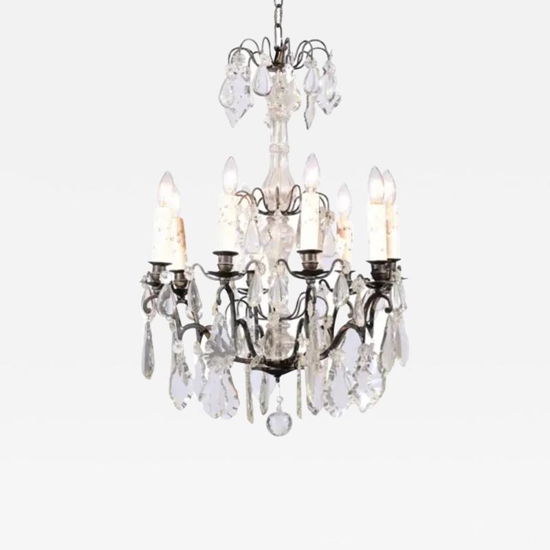 French Late 19th Century Eight Arm Crystal Chandelier with Dark Metal Armature