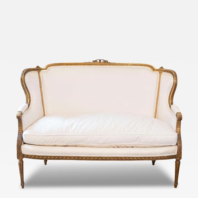French Louis XVI Style Wingback Settee with Original Gilding and New Fabric