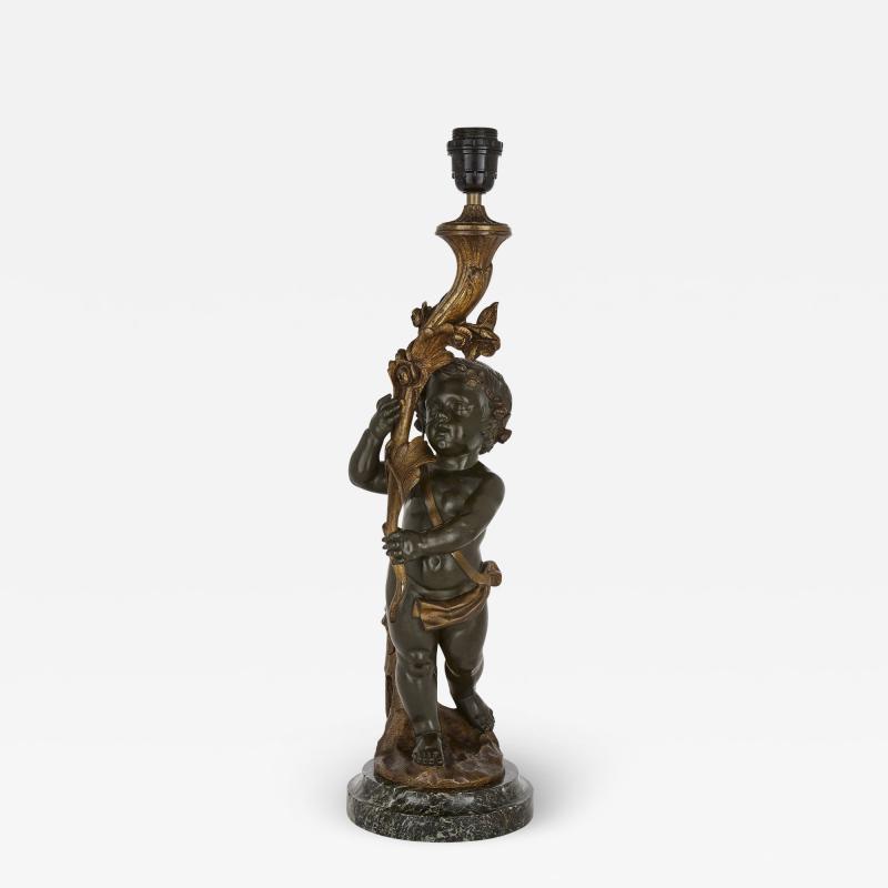 French Patinated Bronze Lamp Modelled as a Putto