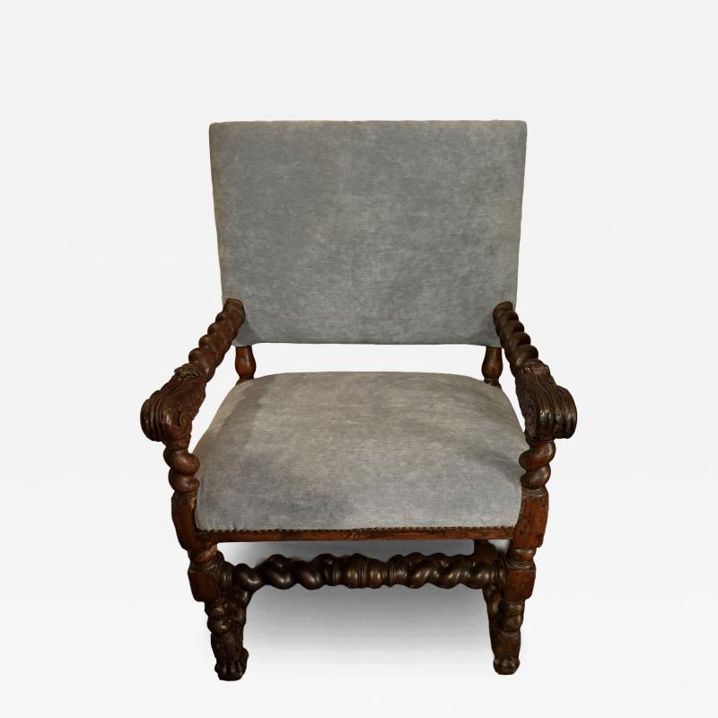 French Renaissance armchair with dog paw feet